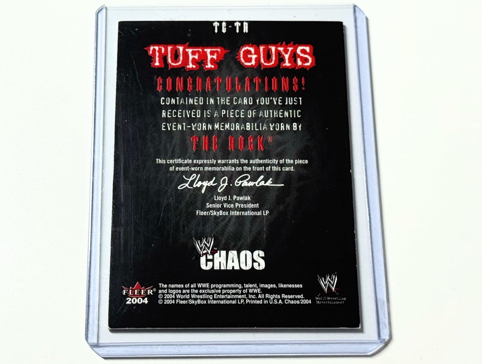 2004 Fleer WWE Chaos The Rock Worn Relic Patch Card TG-TR