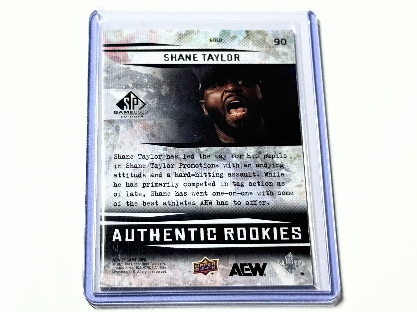 2025 Upper Deck AEW SP Game Used Shane Taylor Authentic Rookies Gold Parallel /99 Card #90