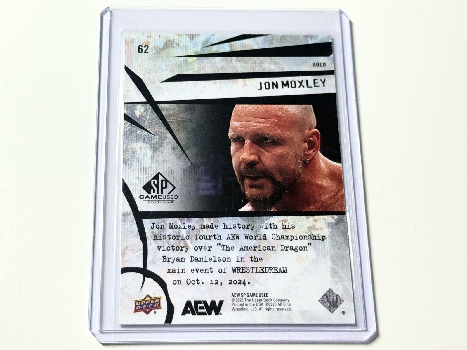 2025 Upper Deck AEW SP Game Used Jon Moxley Gold Parallel /99 Card #62